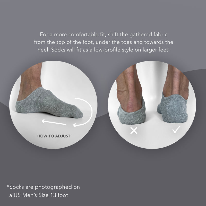 US men's size 13 foot wearing socks, showing how to shift fabric from top of foot under the toes and back towards the heel for added stretch and comfort.